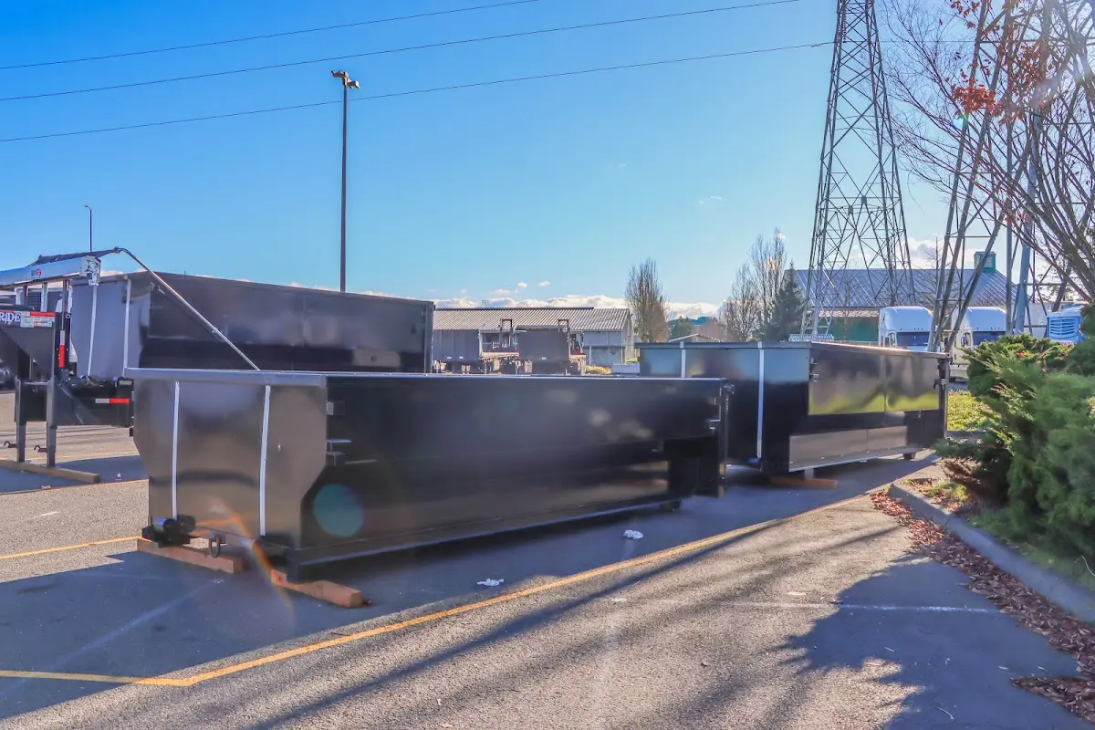 Roll-off dumpster ready for waste disposal at job site for 6 Yard Dumpster Rental in Half Moon Bay